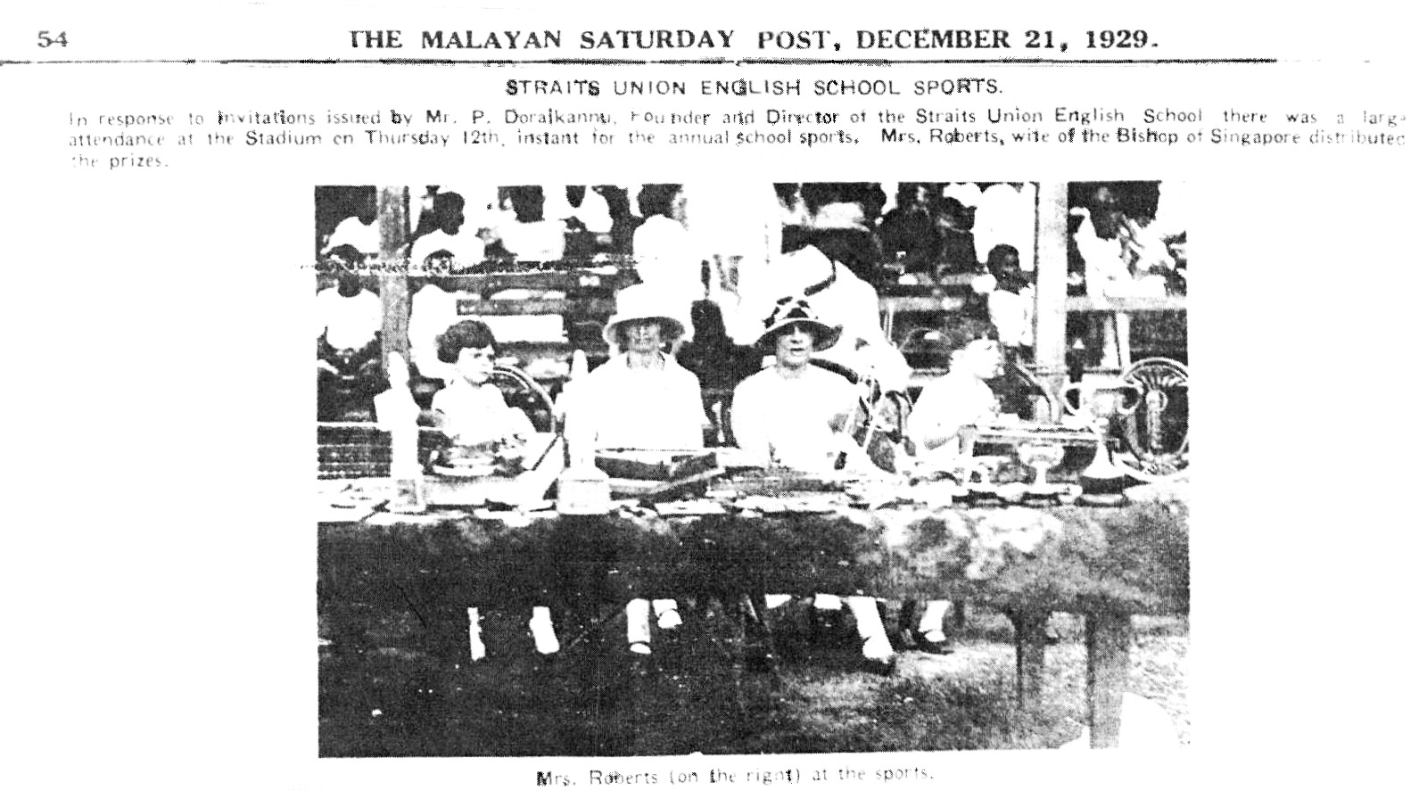 Historical prize distribution scene from Straits Union English School